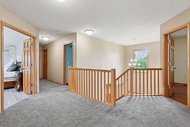 Spacious upper level features large landing and 4 bedrooms upstairs | Image 11
