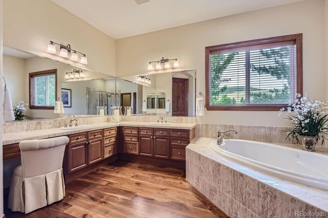 Spacious main floor primary suite bathroom! | Image 29