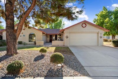 Enjoy this lovely home w/screened in back patio. | Image 1