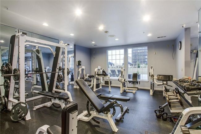 Exercise room with baseboards and recessed lighting | Image 35