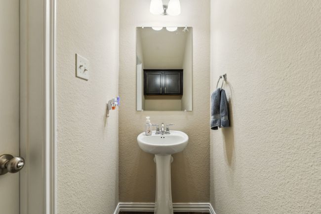 Bathroom with a sink | Image 19