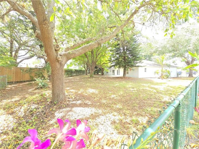 View of fenced yard | Image 42