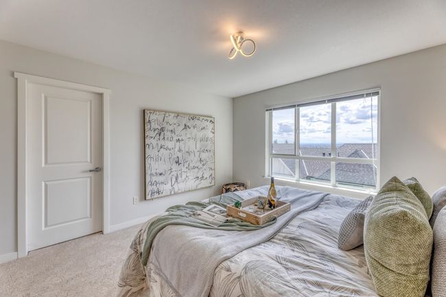 Bedroom featuring carpet floors and baseboards | Image 19