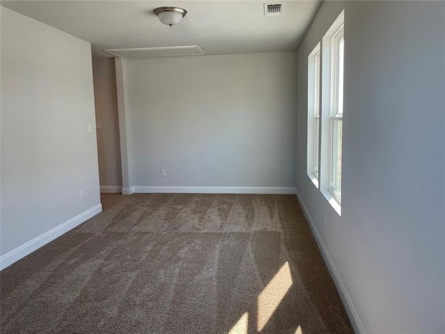 Spare room featuring carpet and baseboards | Image 17