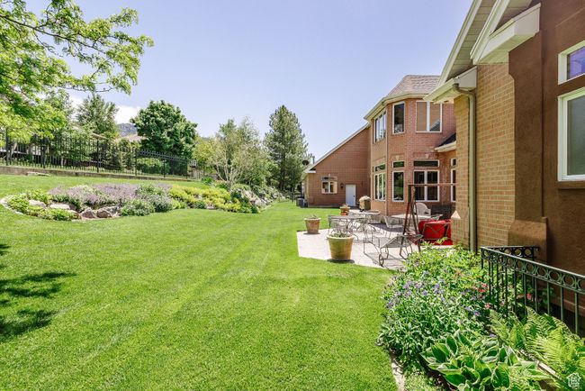 View of yard with a patio area | Image 86
