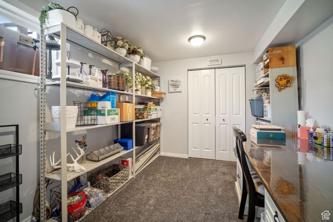 Bedroom or Carpeted office space with baseboards | Image 18
