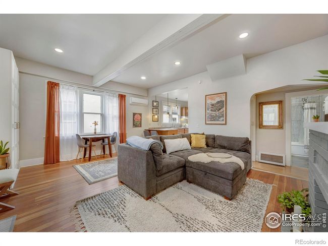 Fresh paint, natural light, and higher ceiling makes this home feel larger. | Image 5