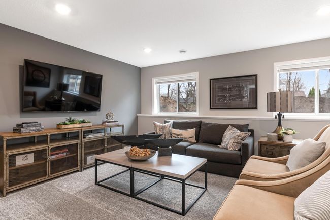 (Photo of decorated model, actual home's finishes will vary) The recreation room can function as the ultimate entertainment space and at-home movie theater. | Image 20
