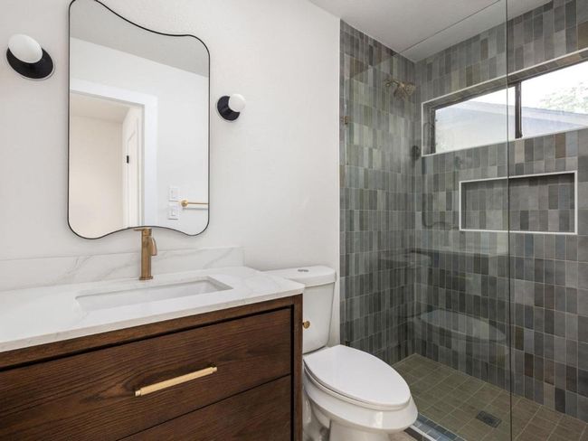 Full bath with vanity and tiled shower | Image 6