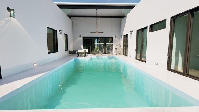 View of swimming pool featuring a ceiling fan, a swimming pool, and a patio area | Image 27