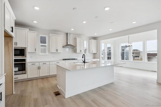 7036 E 126 Th Pl, House other with 4 bedrooms, 3 bathrooms and 3 parking in Thornton CO | Image 5