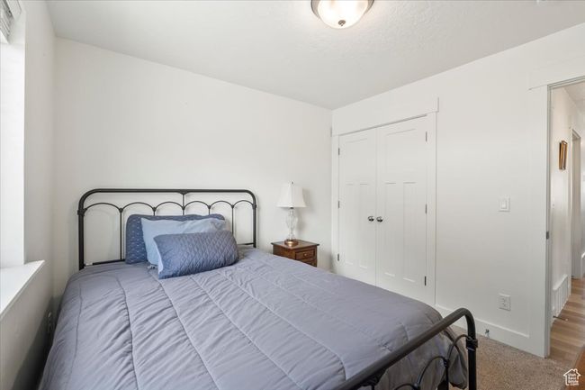 Carpeted bedroom featuring a closet | Image 22