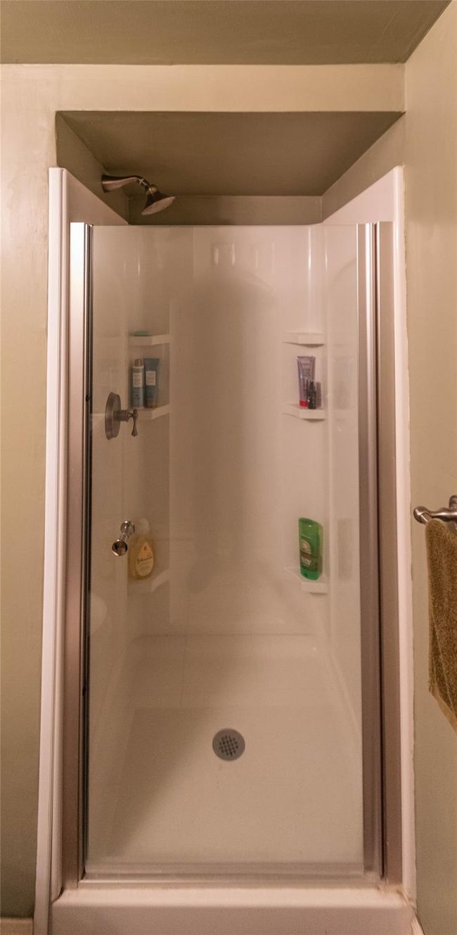 Full bathroom with a stall shower | Image 21