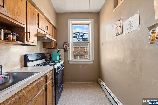 66 Harrison Ave, Home with 6 bedrooms, 2 bathrooms and null parking in Garfield NJ | Image 5