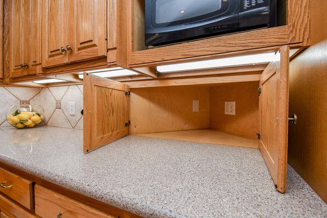 Convenient appliance garage for clutter-free countertops. | Image 14