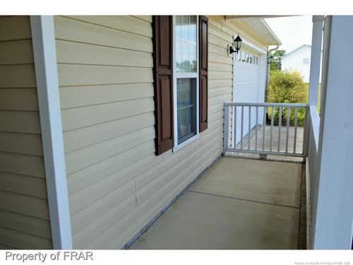 409 Lewis Clark Dr, Hope Mills, NC, 28348-8024 | Card Image