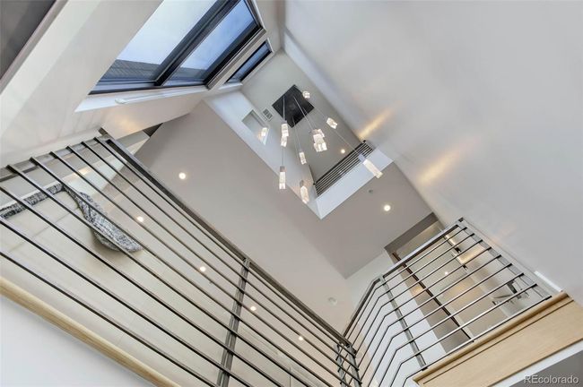 30 foot ceilings and designer chandelier in the entryway. | Image 15