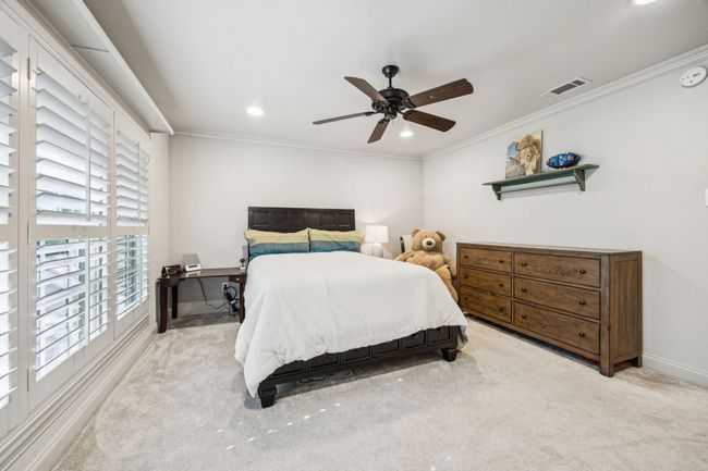Guest bedroom with en suite bathroom and walk in closet. | Image 19