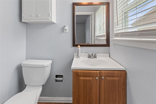 Half bath featuring toilet and vanity | Image 18