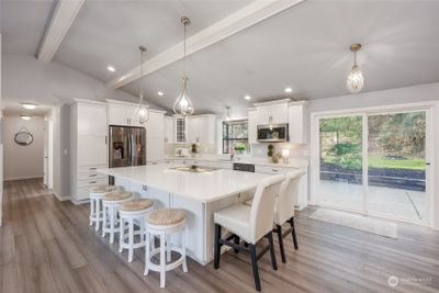 Imagine entertaining in this bright open remodeled kitchen. | Image 2