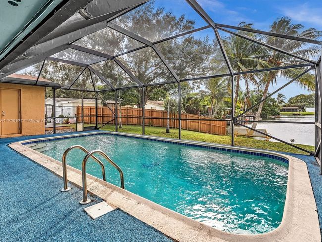 8910 Nw 7 Th Ct, House other with 3 bedrooms, 2 bathrooms and null parking in Pembroke Pines FL | Image 32