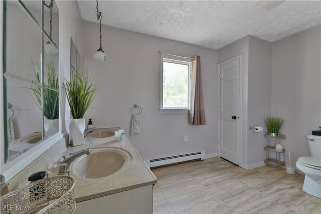 Bathroom with double vanity | Image 17