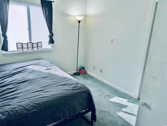 Bedroom featuring carpet | Image 14