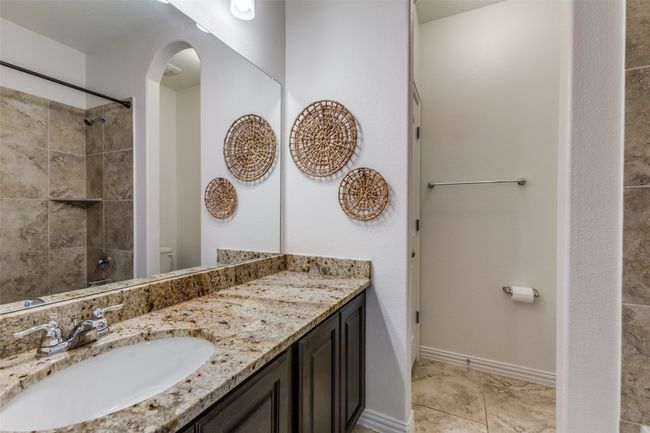 Full bath on the children's wing of the house. You can see the refection of the bathtub in the mirror. | Image 21