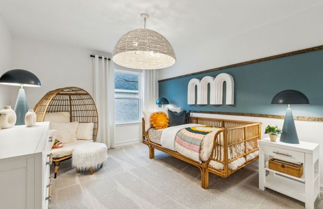 Spacious secondary bedroom with large windows *Photos of furnished model. Not actual home. Representative of floor plan. Some options and features may vary | Image 16