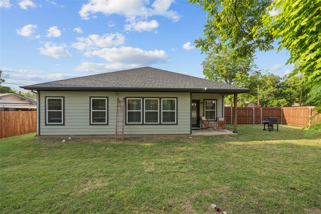 Back of property featuring a patio and roof with shingles | Image 26