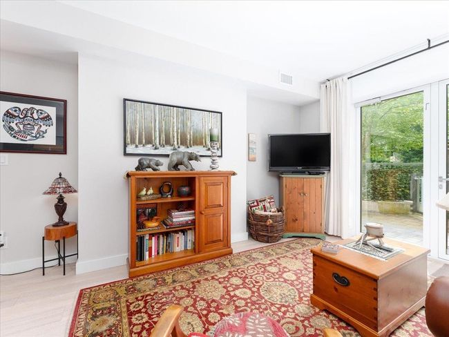 Living room with baseboards | Image 5