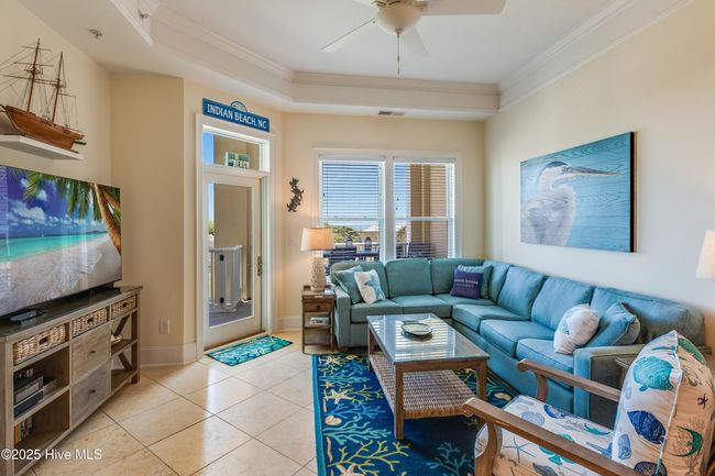 Beautiful limestone flooring is found throughout the main living areas. | Image 4