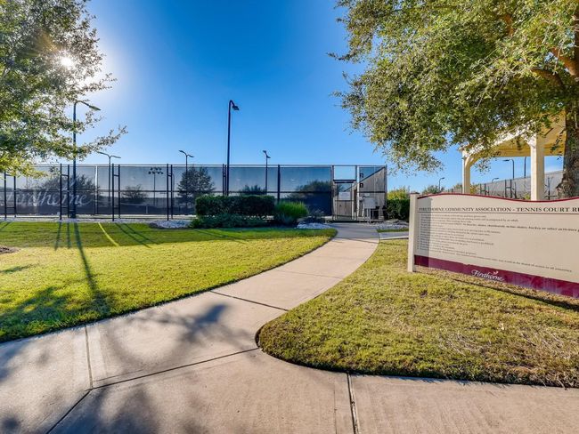Firethorne is an established community with so many amenities included with your LOW HOA dues (just $850/year). This is a view of the tennis & pickleball courts which are just accross from the neighborhood's largest park, volleyball court and sport fields. | Image 31