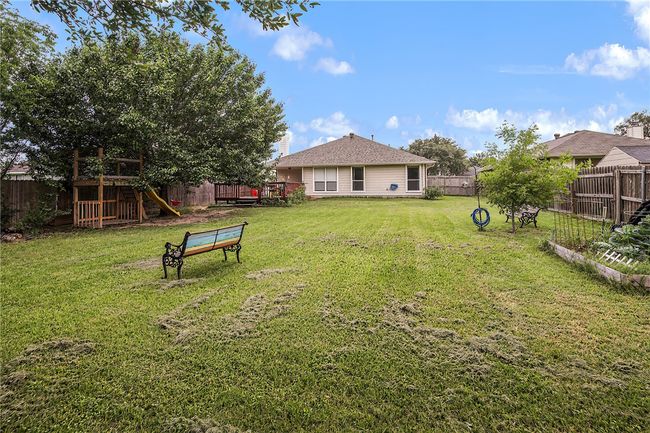 View of yard with garden area. So big! | Image 24