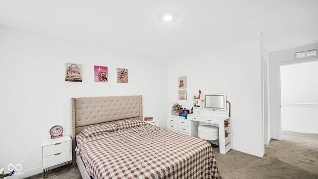 carpeted bedroom with baseboards | Image 22