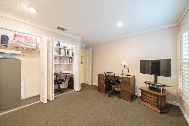 2nd bedroom with closet and built-in desk | Image 26