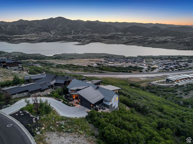 Aerial view at dusk of a water and mountain view | Image 84