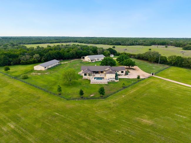 Aerial view of entire property from afar. | Image 26