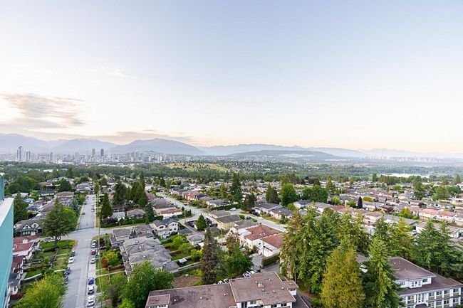 Aerial view at dusk of a mountain view and a residential view | Image 23