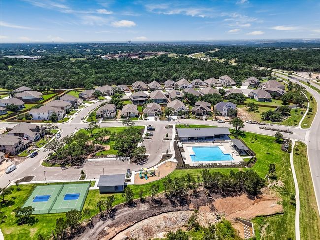 Aerial perspective of suburban area with a pool area | Image 39