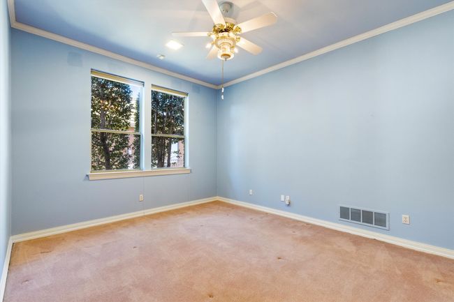 Guest Bedroom with its own separate bath and HUGE walk in closet. | Image 35