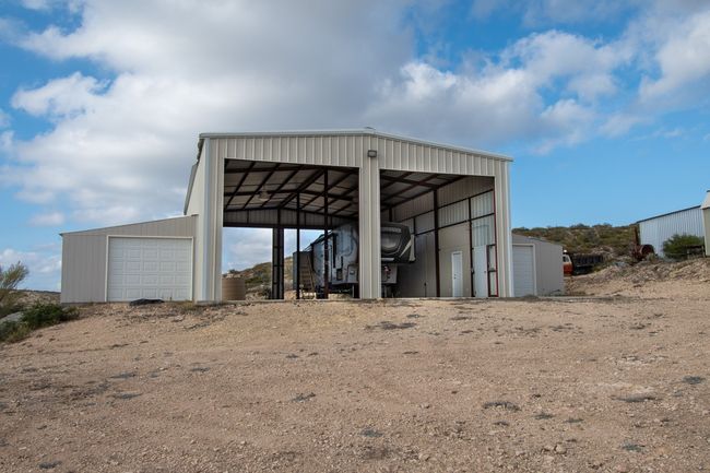 View of outbuilding featuring a garage | Image 28
