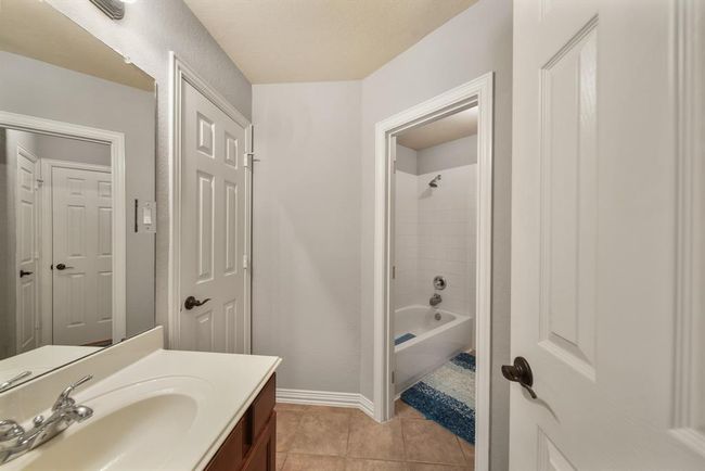 The fifth bedroom's private dressing area and water closet shared with the fourth bedroom. | Image 42