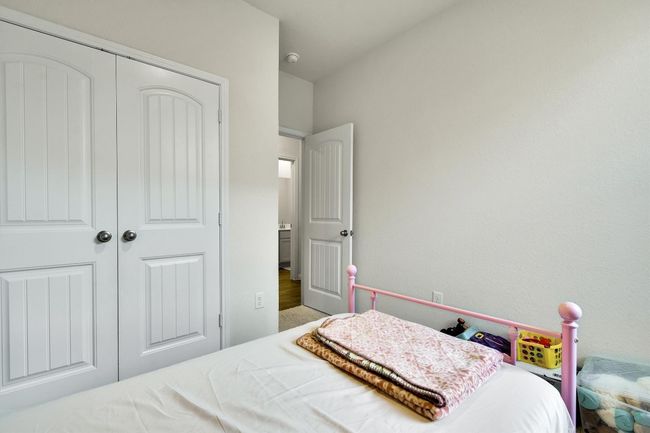 Bedroom featuring a closet | Image 25