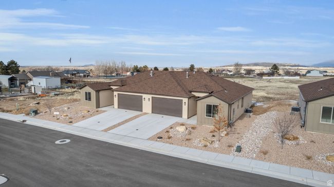 View of front of house featuring a garage | Image 32