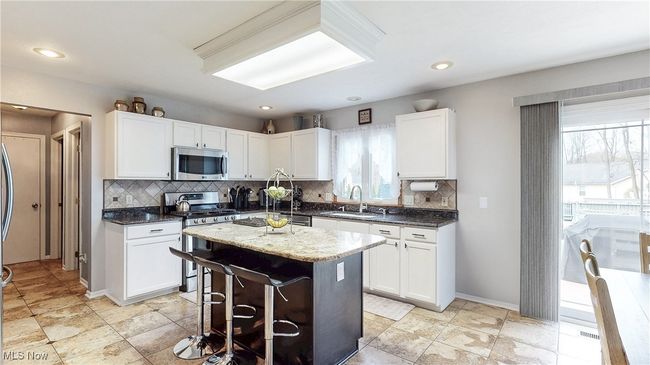 KITCHEN VIEW 2 WITH ISLAND. | Image 10