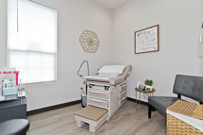 Office space featuring light wood finished floors | Image 15