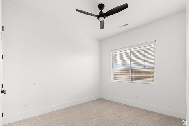 Unfurnished room featuring visible vents, baseboards, a ceiling fan, and carpet floors | Image 23