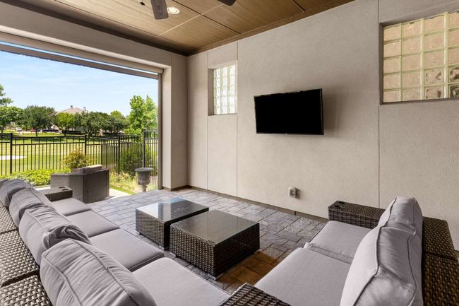 Patio has great view and 3 electric shades. | Image 34