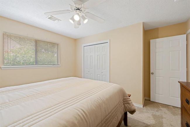 There's ample storage space and great sunlight in Bedroom #3 as well. | Image 34